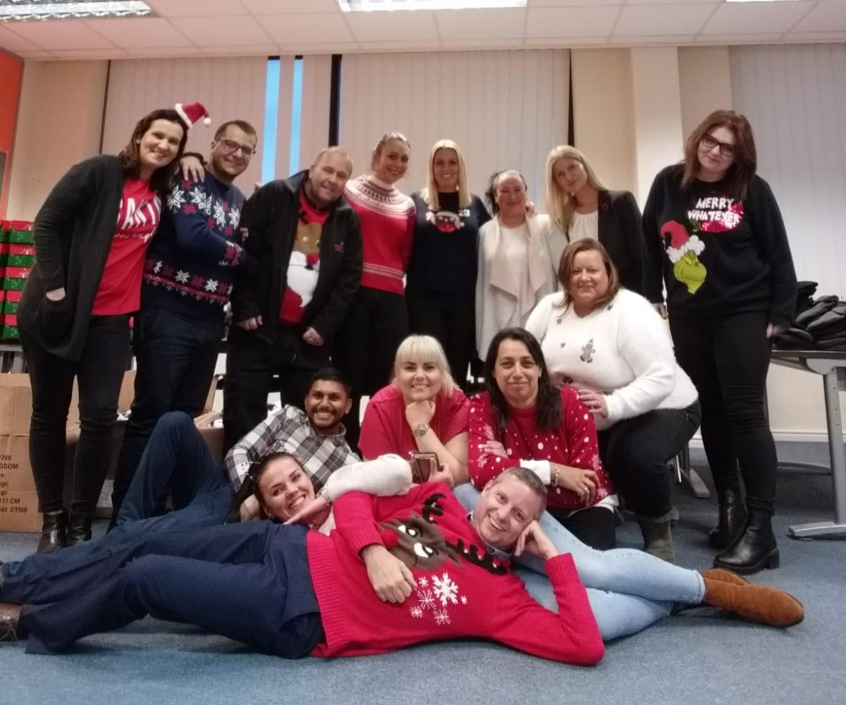 Staffing Match Operation Christmas Child 2019 - team wearing Christmas jumpers