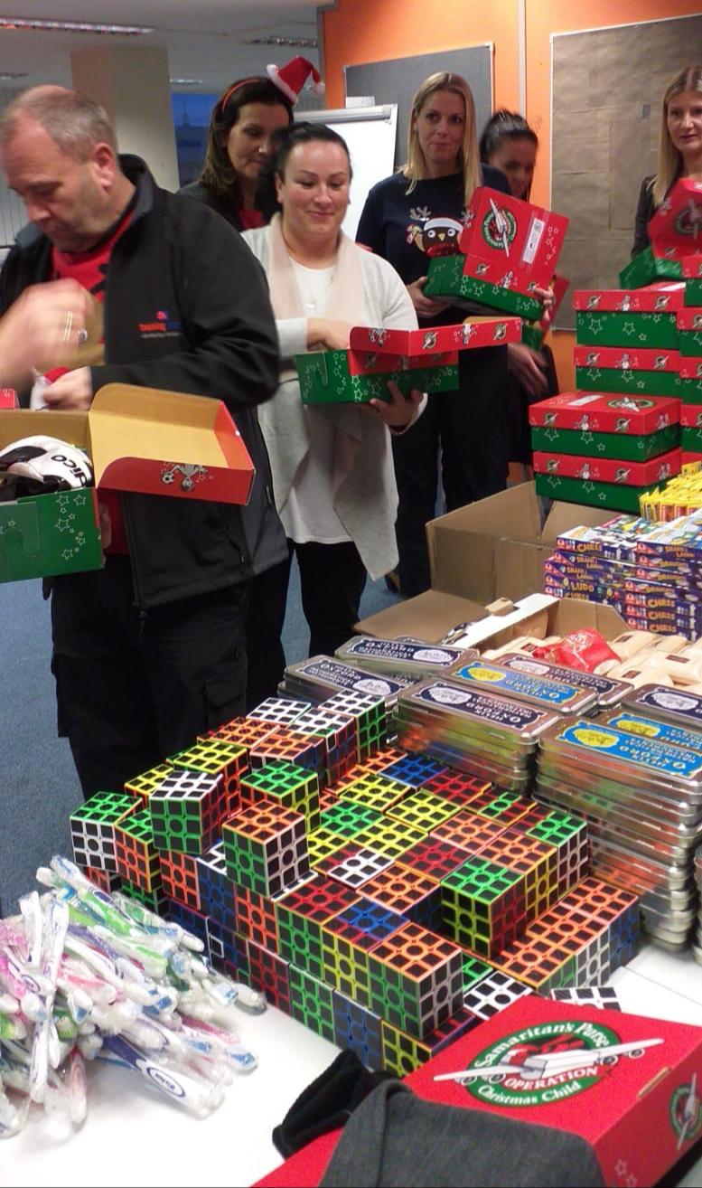 Operation Christmas Child 2019 - staff packing boxes